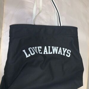 Canvas Tote.
Excellent condition.

Feel free to check out our closet.